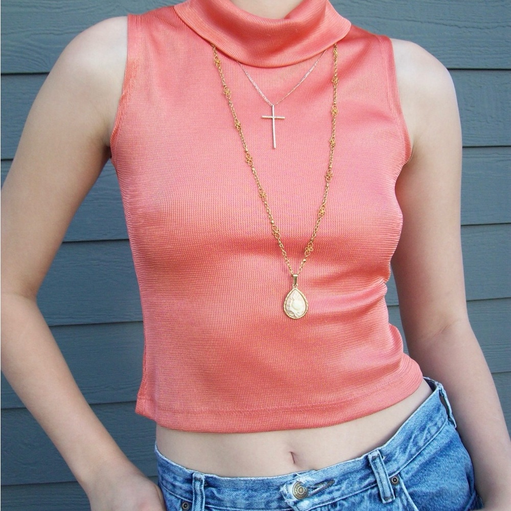 Coral Sleeveless Turtleneck Top